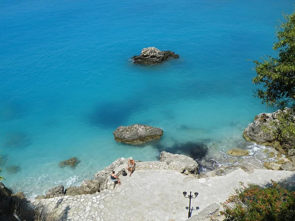 stock image Waterfront of the village of Aghios Nikitas, Lefkada, Greece seen from a panoramic terrace. August 2010