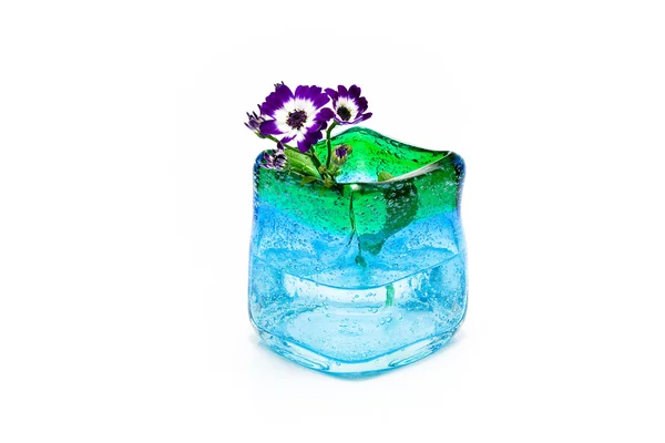 stock image Flowers in blue glass vase