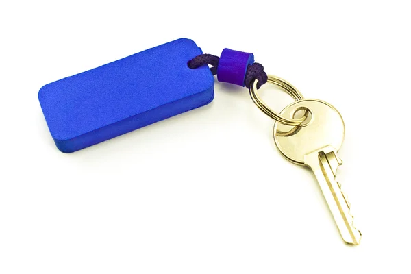 House key with blue tag — Stock Photo, Image