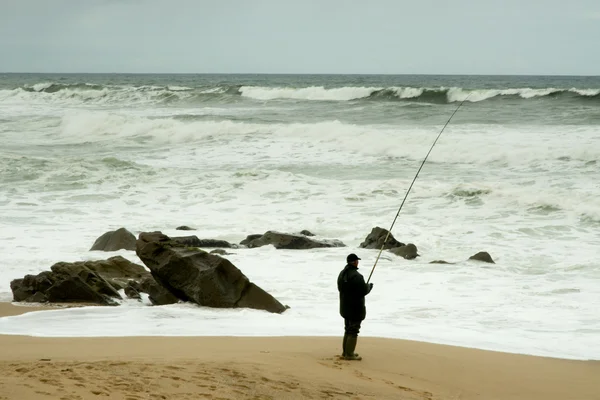 Angler at seaside — Stock Photo, Image