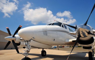 Front nose of a twin engine plane clipart