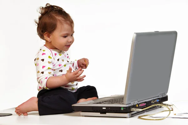 Profile View Cute Toddler Sitting Top Desk Looking Attentively Laptop — Stock Photo, Image