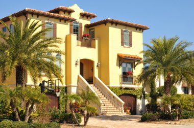 Beautiful three story spanish home in Florida clipart