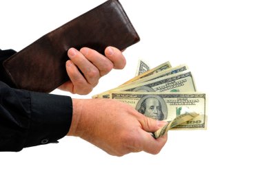 Man handing money. Empty wallet conveys notion that he gave all the money he had. Photographed over white background. clipart