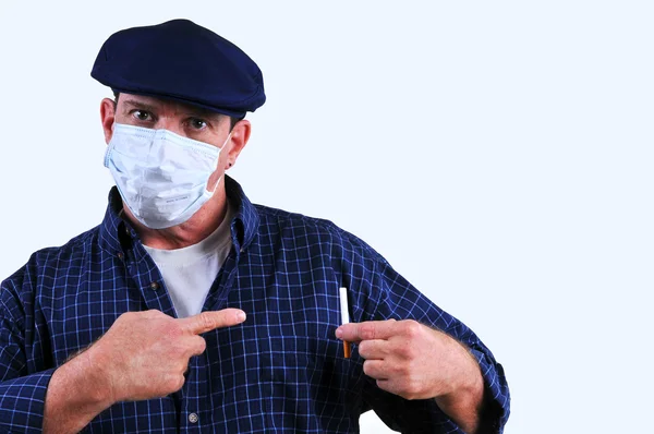 Man Wearing Dust Mask Pointing Cigarette Alluding How Dangerous Smoking Royalty Free Stock Photos