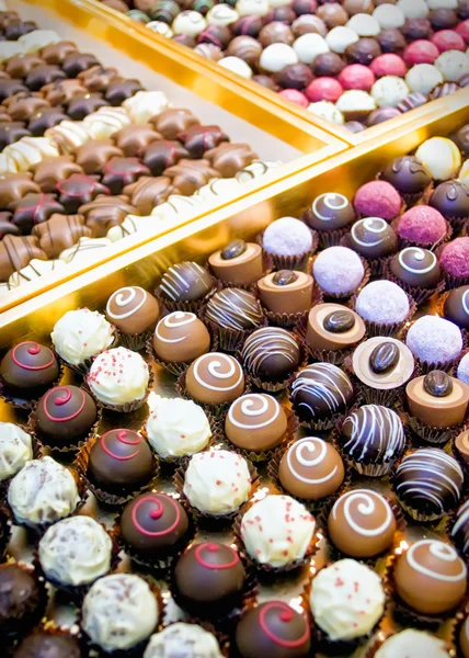 Pralines in a row — Stock Photo, Image