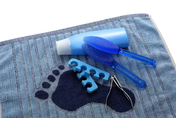 Pé azul SPA em toalha com pegada — Fotografia de Stock