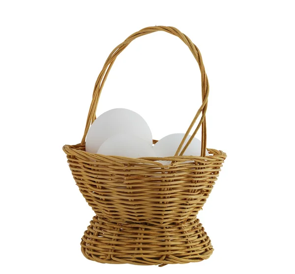 stock image Three white eggs in straw interwoven basket isolated on white