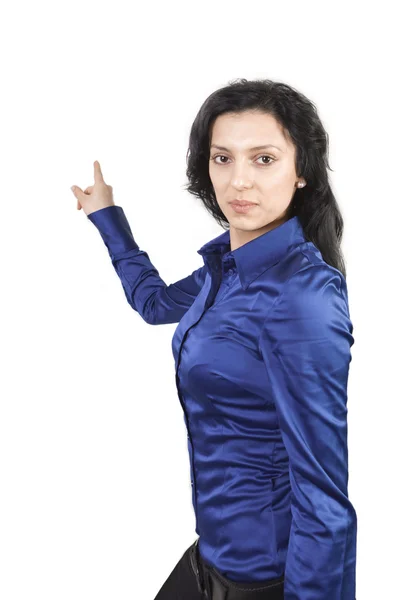 YOUNG FEMALE POINTING TO BACKGROUND Portrait of young woman pointing with h — Stok Foto