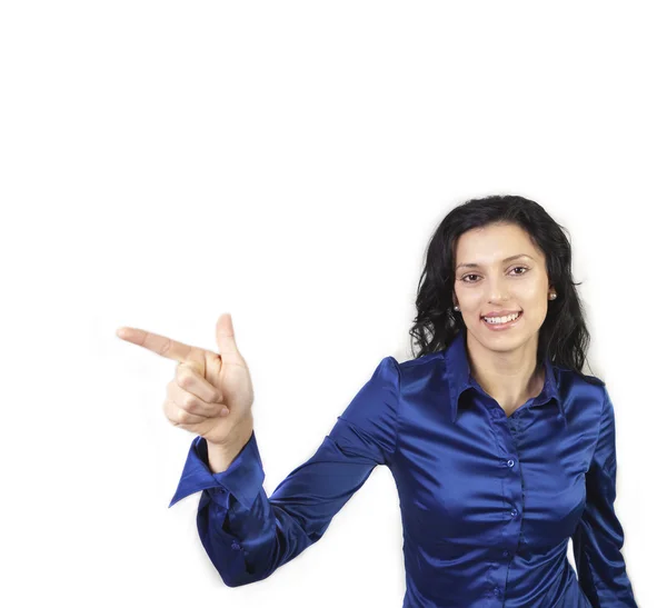 Jonge vrouw met de hand te wijzen naar de kant — Stockfoto