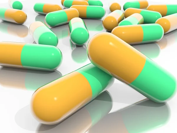 Stock image Orange and Green Pills