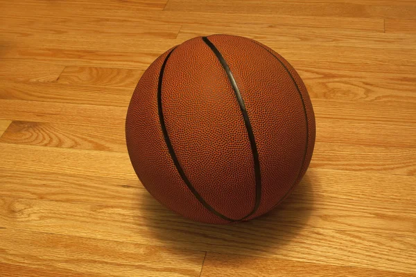 Basketball on the hardwood — Stock Photo, Image