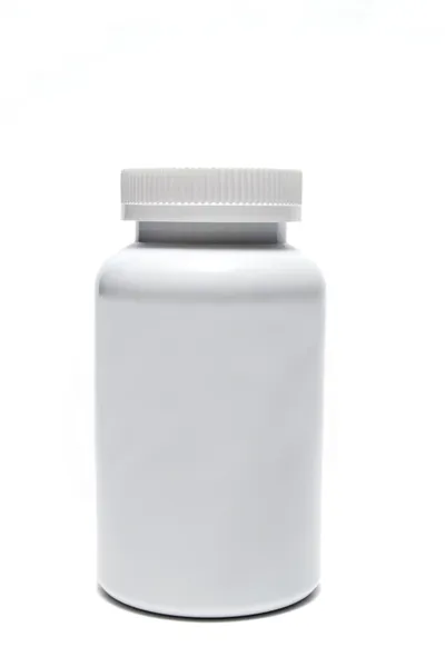Eine Geschlossene Weiße Pillenflasche Vor Weißem Hintergrund Stockbild