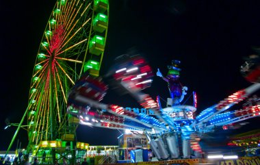 Luna park with round robin and merry go round lights clipart