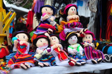 Traditional South American cloth dolls in craft market, Ecuador clipart