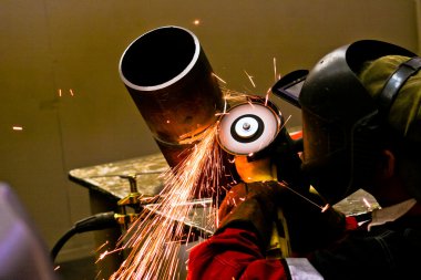 Welding sparks in mask works clipart