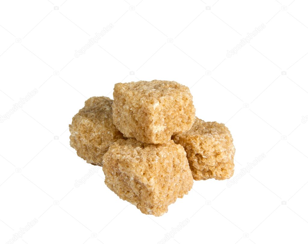 Dark reed sugar in cubes White Backgrounds