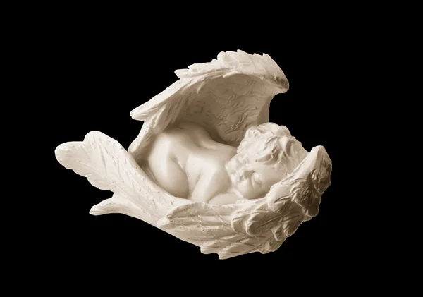 Heykelcik Beyaz Melek kanatları içinde uyuyan güzel — Stok fotoğraf