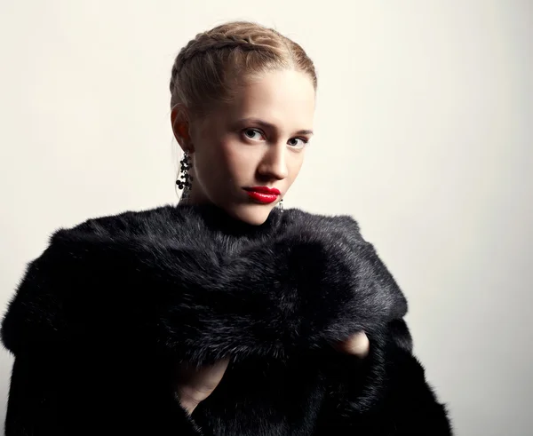 stock image Portrait of a girl in a mink coat