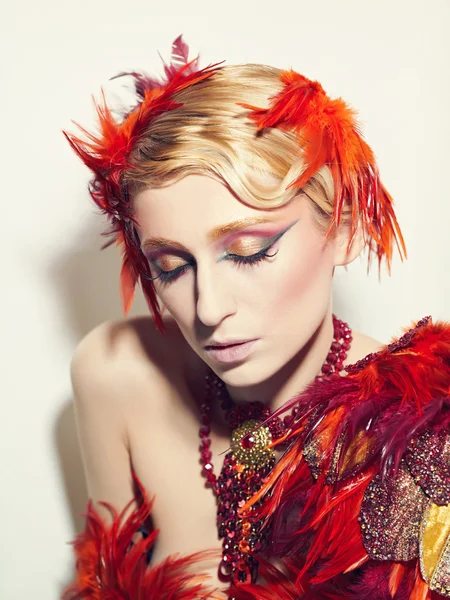 Portrait of a woman with make-up of Phoenix — Stock Photo, Image