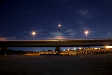 Bridge at night, cars come and go light