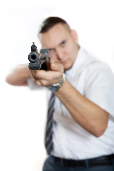 目标带枪的商人 把重点放在枪管上 白色背景 — 图库照片