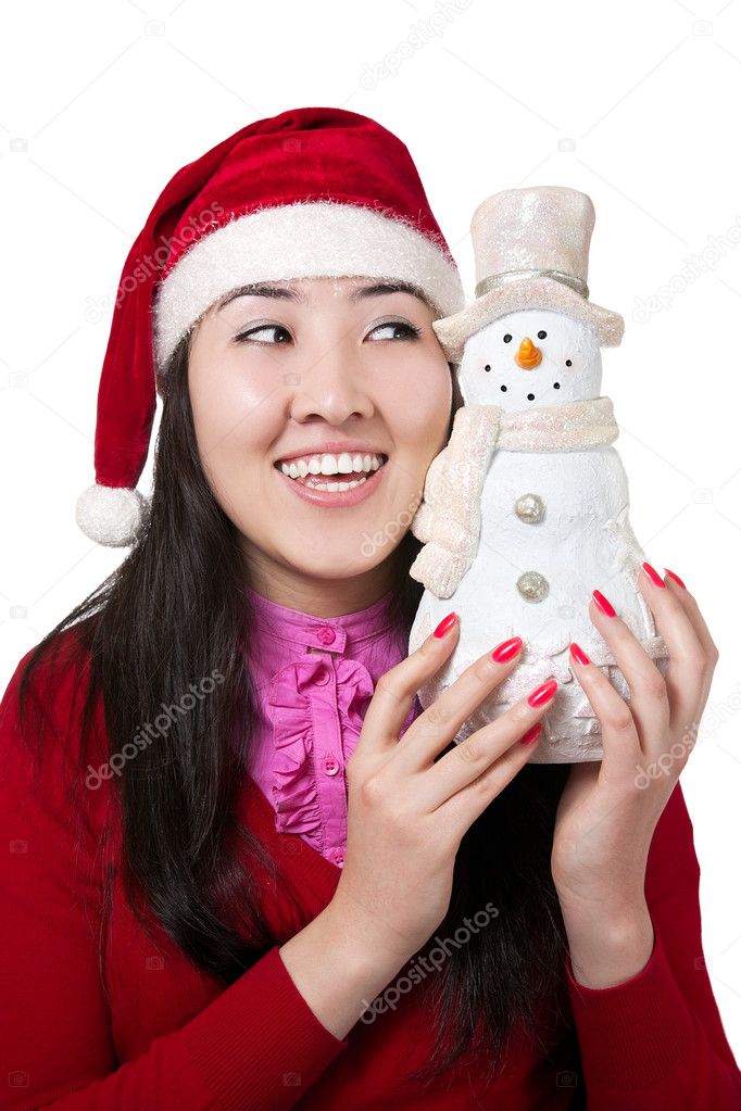 Beautiful Asian girl smiling in Christmas hat with snowman isolated on white background