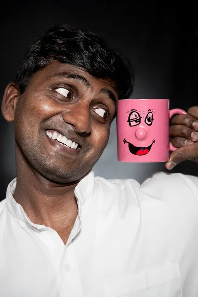 Indian man with funny mug — Stock Photo, Image