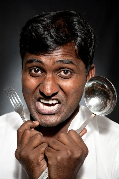 stock image Furious Indian cook