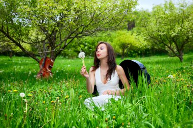 Beautiful girl sitting in cello case clipart