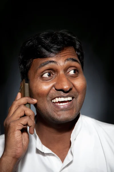 Stock image Indian man talking on the phone