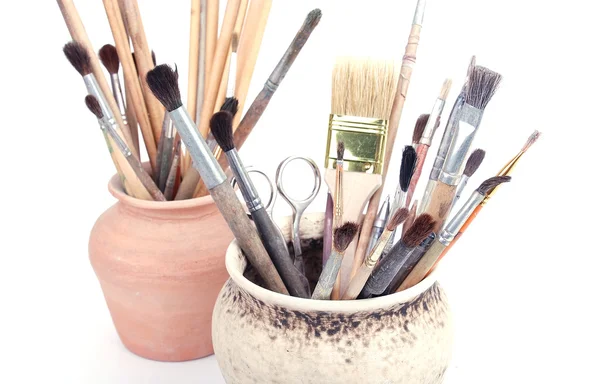 Brushes in pots — Stock Photo, Image