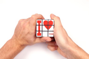 Hand holds the heart, i love you clipart