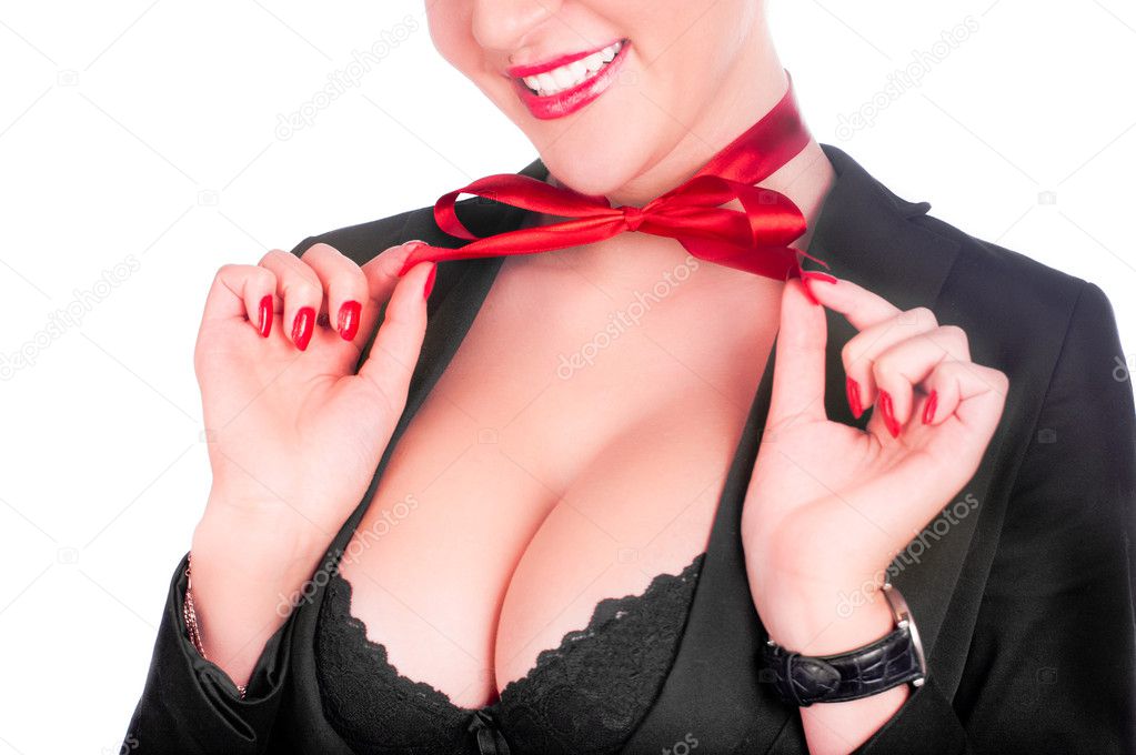 A beautiful sexy gril in a black anderwear with a red bow on her neck (isolated on white)