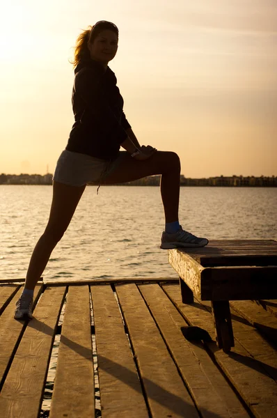 stock image Woman get fitness on sea