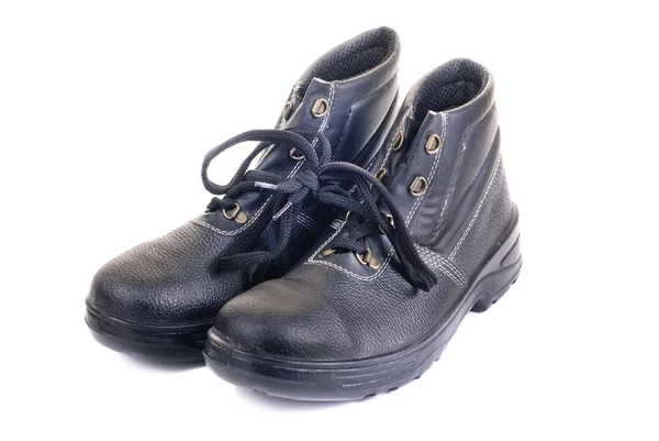 Nuevo obrero botas negro aislado en un blanco —  Fotos de Stock