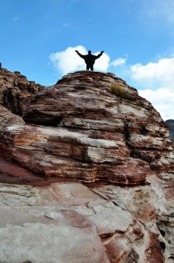 Red Rock Canyon, Man on top of Mountain clipart