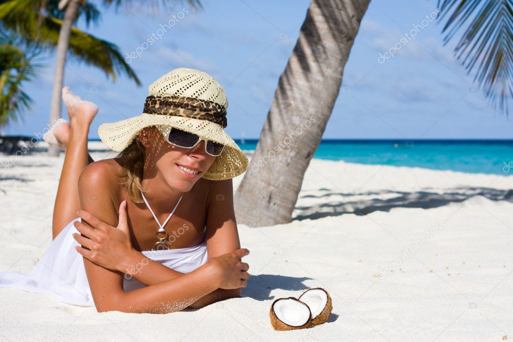 A lady is relax on a tropical beach