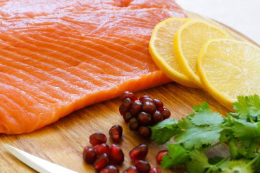 Filleted fish - fresh trout on plate clipart