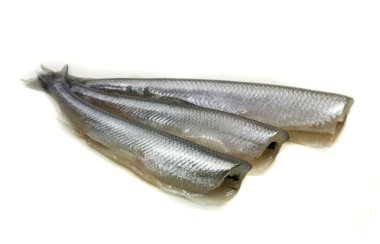 Freh small scale fish without head on white background clipart