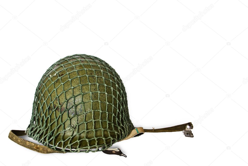 Old military helmet with net isolated on white background