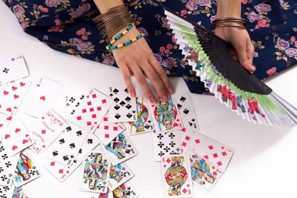 Divinização jogando cartas — Fotografia de Stock