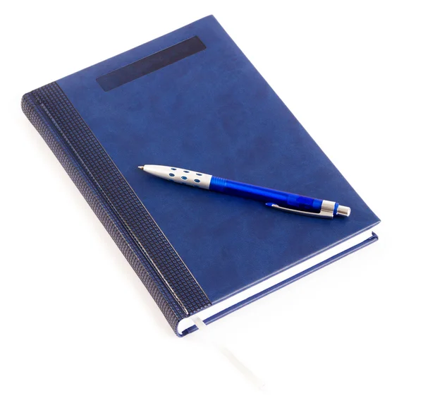 Isolated blue notebook and blue pen on a white background — Stock Photo, Image