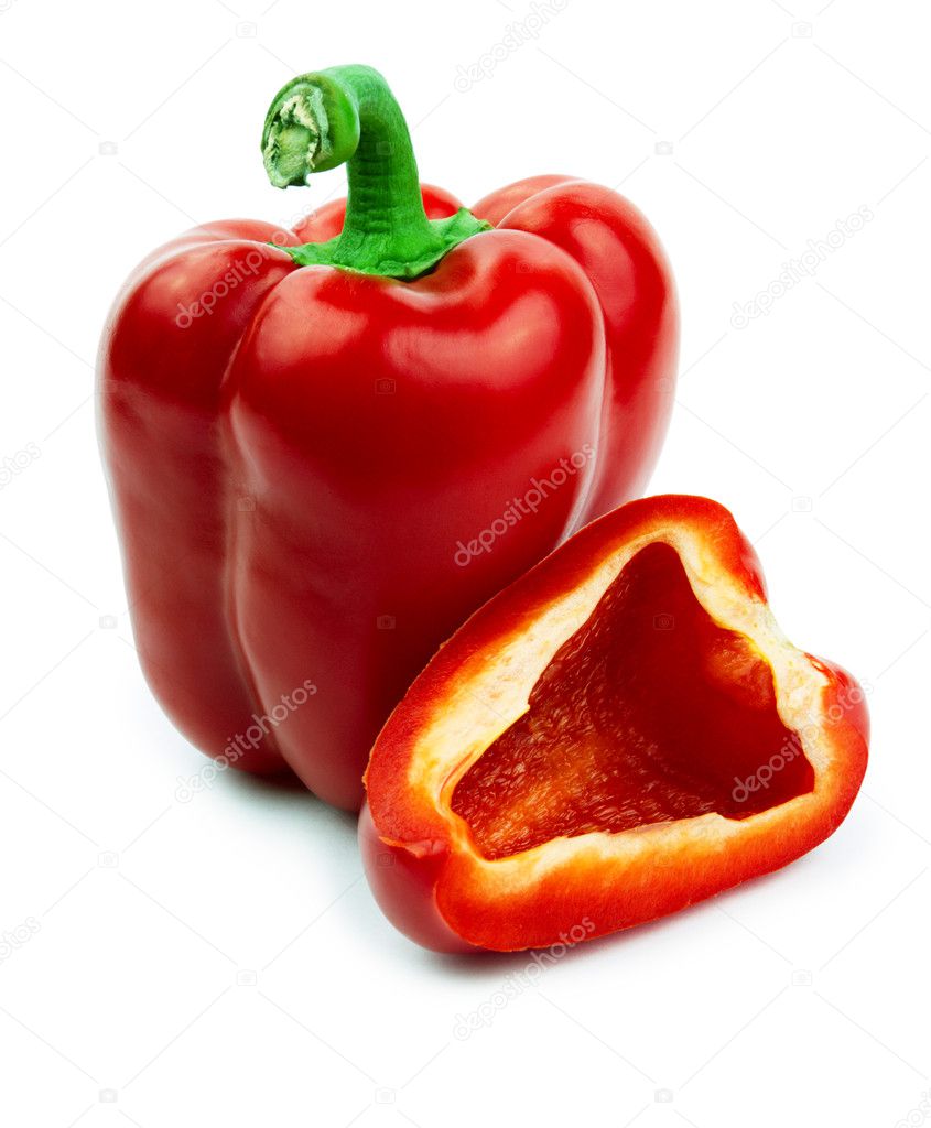 Paprika of red color and its cut off segment isolated on a white background