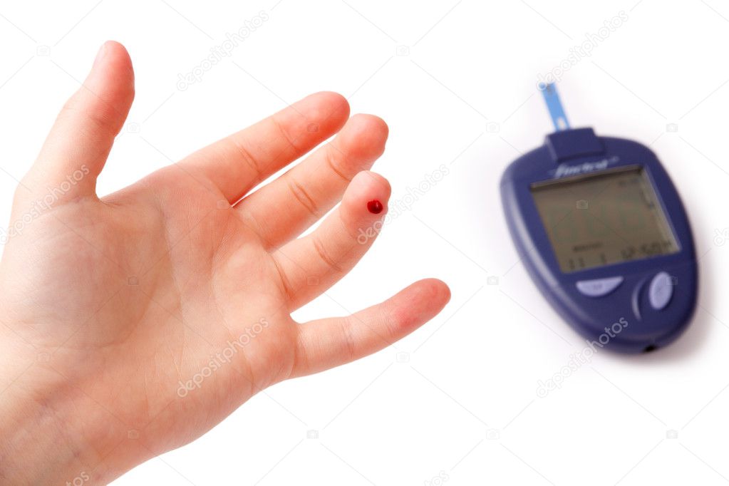 Children's palm with a blood droplet on a finger and the device for measurement of level of glucose in blood isolated on a white background