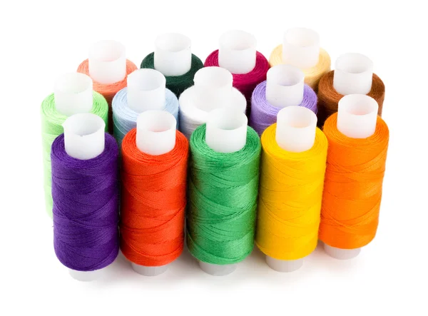 stock image Spools multi-colored threads standing group isolated on a white background