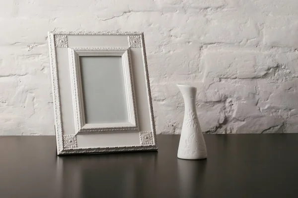 stock image Composition with vintage fotoframe and vase