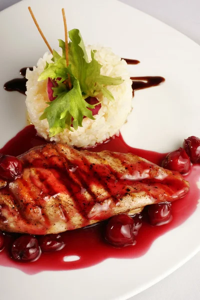 Chicken grill with rice and cherry sauce — Stock Photo, Image