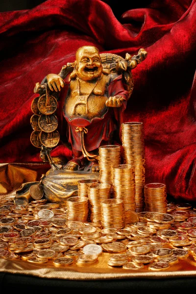stock image Laughing Budda with golden coins