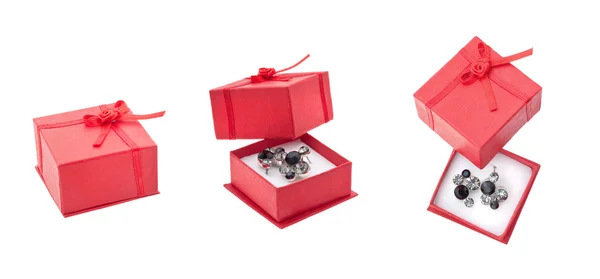 Red present box and earrings — Stock Photo, Image
